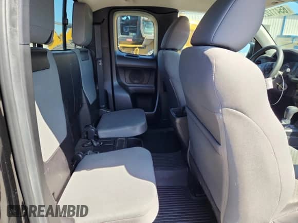 2022 Toyota Tacoma SR z VIN 3TYSZ5AN0NT082424, wystawiony jako Copart lot #65411225 z przebiegiem 22 506 mil mil oraz Szkoda całkowita • Salvage title. Historia ofert i sprzedaży dostępna na DreamBid. Obrazek 10.
