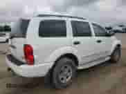 2005 Dodge Durango Limited with VIN 1D4HB58D55F543613, listed as a Copart auction lot 84183795 with 284,878 mi miles and Salvage title. Bid and sale history available at DreamBid. Image 3.