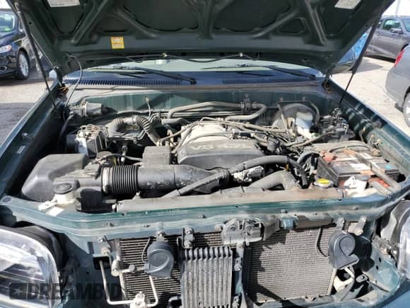 2002 Toyota Tundra Limited z VIN 5TBBT48152S291074, wystawiony jako Copart lot #81852585 z przebiegiem 269 192 mil mil oraz Szkoda całkowita • Salvage title. Historia ofert i sprzedaży dostępna na DreamBid. Obrazek 11.