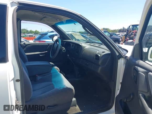 1999 Dodge Dakota SLT z VIN 1B7GG22X8XS301937, wystawiony jako IAAI lot #42628522 z przebiegiem Nie podano mil oraz . Historia ofert i sprzedaży dostępna na DreamBid. Obrazek 5.