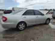 2002 Toyota Camry LE z VIN 4T1BF30K02U013039, wystawiony jako Copart lot #85106395 z przebiegiem 251 211 mil mil oraz Szkoda całkowita • Salvage title. Historia ofert i sprzedaży dostępna na DreamBid. Obrazek 3.