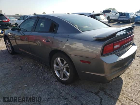 2011 Dodge Charger RT with VIN 2B3CM5CT2BH610941, listed as a Copart auction lot 63684095 with 153,143 mi miles and Clean title. Bid and sale history available at DreamBid. Image 2.