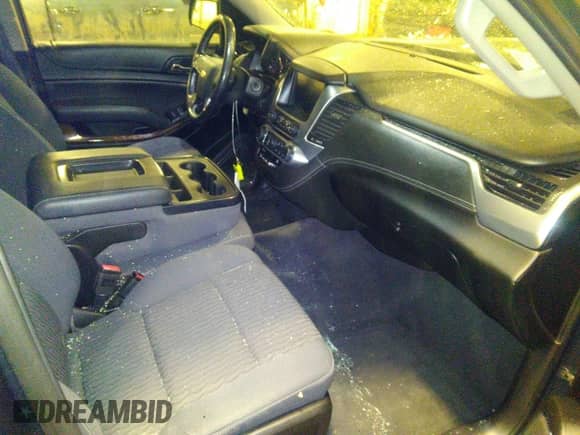 2019 Chevrolet Tahoe LS with VIN 1GNSKAEC6KR121486, listed as a IAAI auction lot 41064193 with 118,108 mi miles and . Bid and sale history available at DreamBid. Image 5.