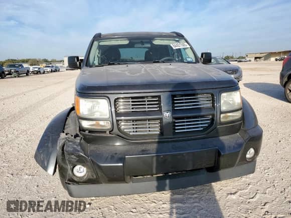 2011 Dodge Nitro Heat with VIN 1D4PT4GK9BW570618, listed as a Copart auction lot 84421505 with 76,339 mi miles and Salvage title. Bid and sale history available at DreamBid. Image 5.