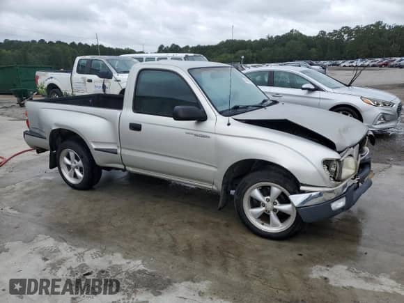 2002 Toyota Tacoma с VIN 5TENL42N42Z010806, выставлен на аукционе Copart как лот 84645105 с пробегом 199 343 миль миль и Списание • Salvage title. История ставок и продаж доступна на DreamBid. Изображение 4.
