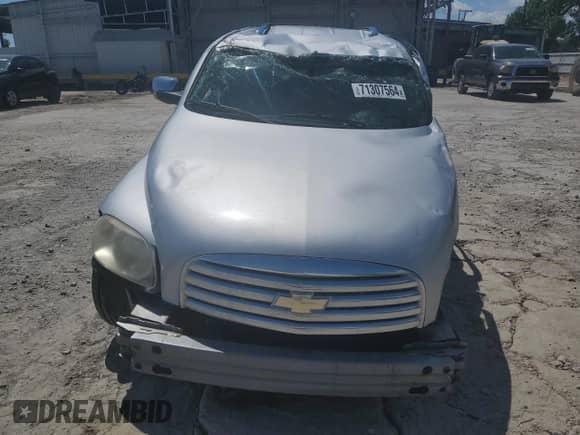 2009 Chevrolet HHR 1LT z VIN 3GNCA23B99S574824, wystawiony jako Copart lot #71307564 z przebiegiem Nie podano mil oraz Szkoda całkowita • Salvage title. Historia ofert i sprzedaży dostępna na DreamBid. Obrazek 5.