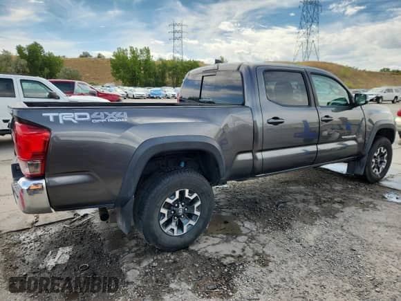 2017 Toyota Tacoma SR5 с VIN 3TMDZ5BN5HM017544, выставлен на аукционе Copart как лот 71926035 с пробегом 117 939 миль миль и Списание • Salvage title. История ставок и продаж доступна на DreamBid. Изображение 3.