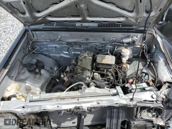 1988 Dodge RAM with VIN JB7FL24D7JP103516, listed as a Copart auction lot 59259515 with 210,940 mi miles and Salvage title. Bid and sale history available at DreamBid. Image 11.
