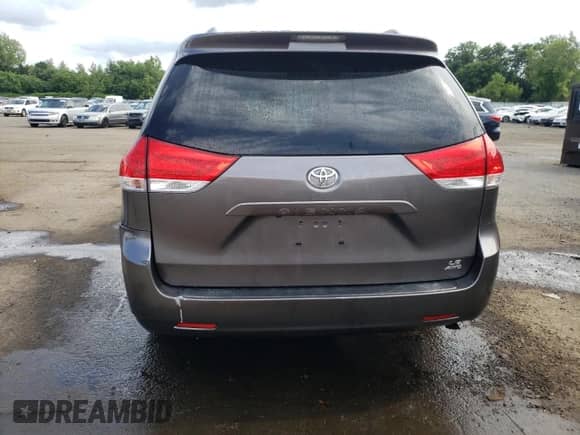 2012 Toyota Sienna LE with VIN 5TDJK3DC2CS033328, listed as a Copart auction lot 62202895 with 169,392 mi miles and Salvage title. Bid and sale history available at DreamBid. Image 6.