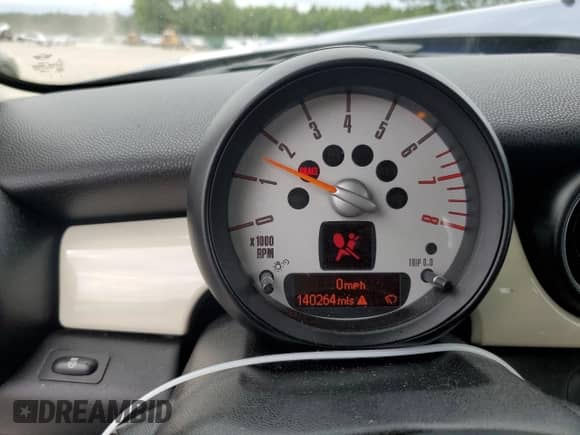 2013 MINI Hardtop S with VIN WMWSV3C57DT476394, listed as a Copart auction lot 61612244 with 140,264 mi miles and Salvage title. Bid and sale history available at DreamBid. Image 9.