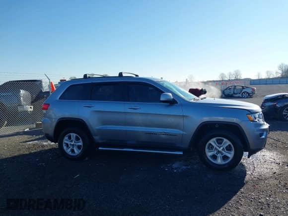 2017 Jeep Grand Cherokee Laredo with VIN 1C4RJEAG3HC890386, listed as a IAAI auction lot 41790836 with 67,166 mi miles and . Bid and sale history available at DreamBid. Image 13.
