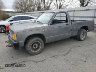 1988 Chevrolet S-10 с VIN 1GCBS14E1J2210255, выставлен на аукционе Copart как лот 47160765 с пробегом 177 999 миль миль и Списание • Salvage title. История ставок и продаж доступна на DreamBid. Изображение 1.