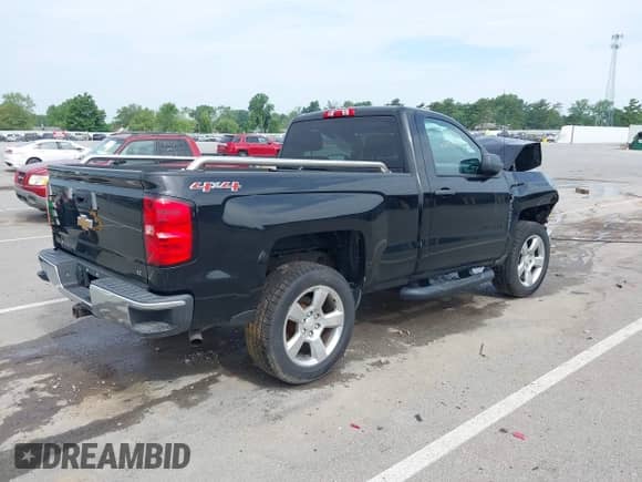 2014 Chevrolet Silverado 1500 LT with VIN 1GCNKREH4EZ348664, listed as a IAAI auction lot 42513995 with 212,233 mi miles and . Bid and sale history available at DreamBid. Image 4.