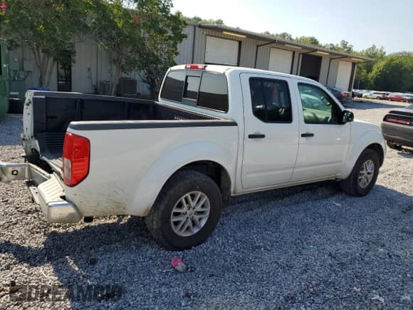 2016 Nissan Frontier S with VIN 1N6AD0ER7GN737996, listed as a Copart auction lot 64569495 with 118,460 mi miles and Salvage title. Bid and sale history available at DreamBid. Image 3.