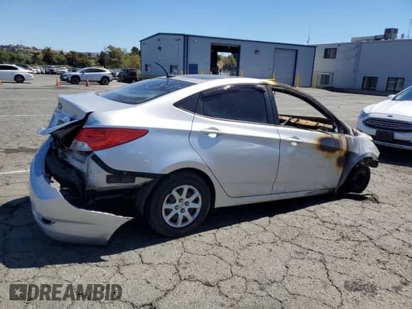 2014 Hyundai Accent GLS с VIN KMHCT4AE9EU607726, выставлен на аукционе Copart как лот 69487855 с пробегом Не указан миль и На запчасти • Non repairable. История ставок и продаж доступна на DreamBid. Изображение 3.