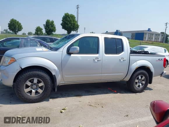2011 Nissan Frontier Pro-4X with VIN 1N6AD0EV0BC415542, listed as a IAAI auction lot 42455036 with 153,099 mi miles and . Bid and sale history available at DreamBid. Image 14.