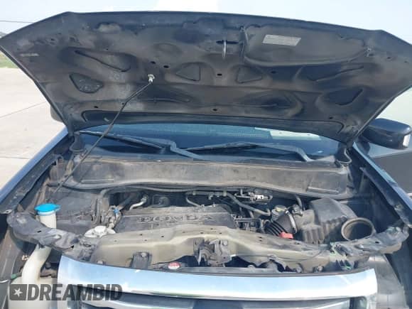 2012 Honda Pilot Touring with VIN 5FNYF4H93CB044933, listed as a IAAI auction lot 43249328 with 218,196 mi miles and . Bid and sale history available at DreamBid. Image 10.