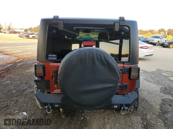 2014 Jeep Wrangler Rubicon with VIN 1C4BJWCG6EL185596, listed as a Copart auction lot 78497654 with 69,875 mi miles and Salvage title. Bid and sale history available at DreamBid. Image 6.