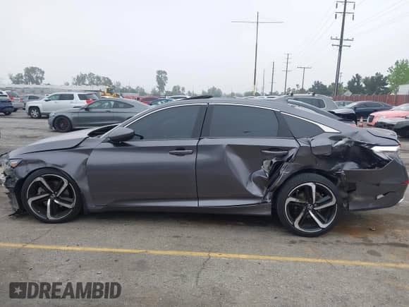 2018 Honda Accord Sport with VIN 1HGCV2F37JA031397, listed as a IAAI auction lot 42014632 with 118,916 mi miles and . Bid and sale history available at DreamBid. Image 19.