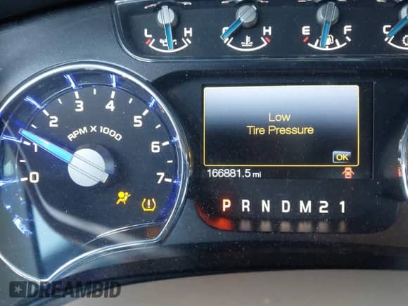 2013 Ford F-150 XL with VIN 1FTFW1EF9DKE08938, listed as a IAAI auction lot 43392604 with 166,881 mi miles and . Bid and sale history available at DreamBid. Image 7.