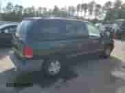 1998 Dodge Caravan with VIN 2B4FP25B1WR827822, listed as a Copart auction lot 70676574 with 192,726 mi miles and Salvage title. Bid and sale history available at DreamBid. Image 3.