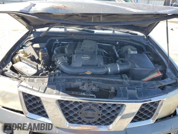 2006 Nissan Frontier SE with VIN 1N6AD07U36C427985, listed as a Copart auction lot 65688815 with 327,628 mi miles and Salvage title. Bid and sale history available at DreamBid. Image 11.