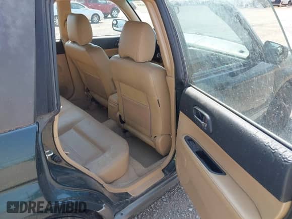 2005 Subaru Forester XS with VIN JF1SG65625H724811, listed as a IAAI auction lot 43100688 with 325,137 mi miles and . Bid and sale history available at DreamBid. Image 8.