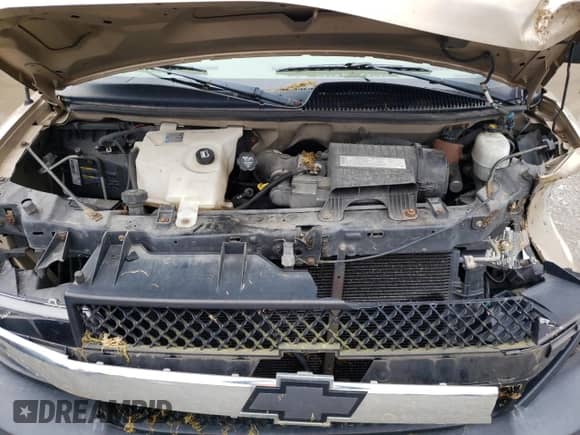 2006 Chevrolet Express Passenger z VIN 1GNFG15T961223498, wystawiony jako Copart lot #45679095 z przebiegiem 191 266 mil mil oraz Szkoda całkowita • Salvage title. Historia ofert i sprzedaży dostępna na DreamBid. Obrazek 12.