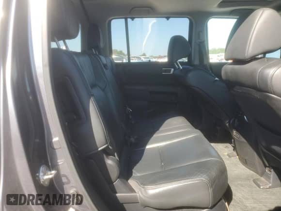 2014 Honda Pilot Touring with VIN 5FNYF3H93EB027479, listed as a Copart auction lot 71527965 with 195,840 mi miles and Salvage title. Bid and sale history available at DreamBid. Image 11.