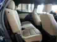 2022 Chevrolet Traverse LS z VIN 1GNERFKWXNJ138301, wystawiony jako Copart lot #59887205 z przebiegiem Nie podano mil oraz Szkoda całkowita • Salvage title. Historia ofert i sprzedaży dostępna na DreamBid. Obrazek 11.