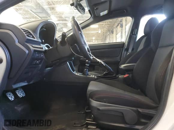 2021 Subaru WRX with VIN JF1VA1A6XM9818869, listed as a Copart auction lot 55393895 with 73,385 mi miles and Salvage title. Bid and sale history available at DreamBid. Image 7.