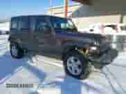 2022 Jeep Wrangler Unlimited Sport with VIN 1C4HJXDG5NW157317, listed as a IAAI auction lot 41374590 with 67,632 mi miles and . Bid and sale history available at DreamBid. Image 1.