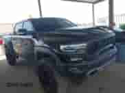 2022 Ram 1500 TRX with VIN 1C6SRFU90NN369047, listed as a IAAI auction lot 42562232 with 14,501 mi miles and . Bid and sale history available at DreamBid. Image 1.