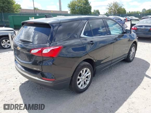 2019 Chevrolet Equinox LT z VIN 2GNAXTEV6K6279686, wystawiony jako IAAI lot #43095694 z przebiegiem 201 421 mil mil oraz . Historia ofert i sprzedaży dostępna na DreamBid. Obrazek 4.