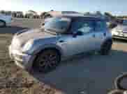 2004 MINI Hardtop with VIN WMWRC33494TC54180, listed as a Copart auction lot 87096995 with 160,028 mi miles and Salvage title. Bid and sale history available at DreamBid. Image 1.