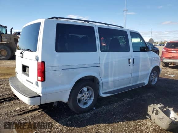 2003 Chevrolet Astro с VIN 1GNDM19X23B119762, выставлен на аукционе Copart как лот 82208435 с пробегом 99 326 миль миль и Чистый • Clean title. История ставок и продаж доступна на DreamBid. Изображение 3.