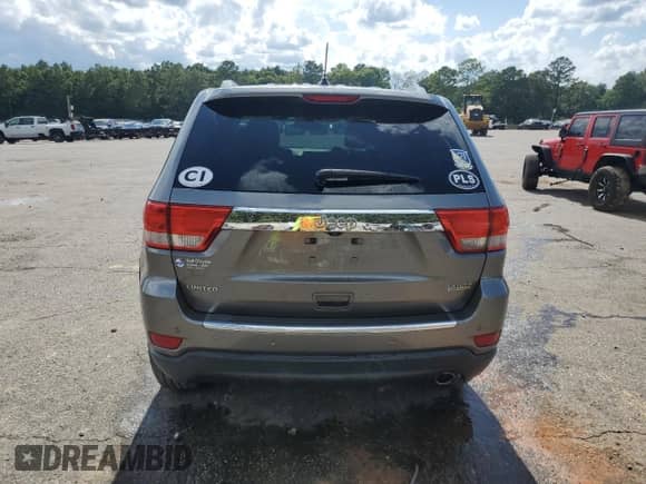 2012 Jeep Grand Cherokee Limited z VIN 1C4RJEBG7CC276299, wystawiony jako Copart lot #64085755 z przebiegiem 86 272 mil mil oraz Szkoda całkowita • Salvage title. Historia ofert i sprzedaży dostępna na DreamBid. Obrazek 6.