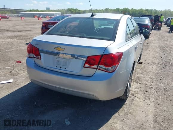 2015 Chevrolet Cruze LS with VIN 1G1PB5SH9F7118761, listed as a IAAI auction lot 42252338 with 107,981 mi miles and . Bid and sale history available at DreamBid. Image 4.
