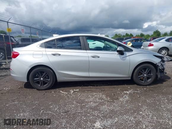 2016 Chevrolet Cruze LT with VIN 1G1BE5SM7G7318795, listed as a IAAI auction lot 43049413 with 100,259 mi miles and . Bid and sale history available at DreamBid. Image 14.
