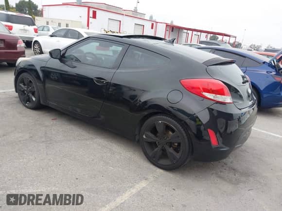 2015 Hyundai Veloster with VIN KMHTC6AD4FU240867, listed as a IAAI auction lot 42887164 with 94,620 mi miles and . Bid and sale history available at DreamBid. Image 3.
