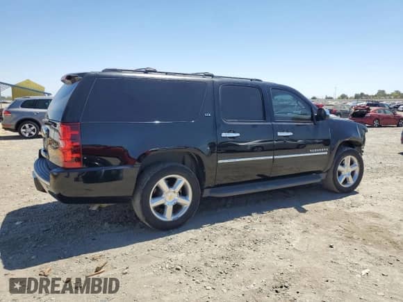 2013 Chevrolet Suburban LTZ с VIN 1GNSKKE78DR294552, выставлен на аукционе Copart как лот 68204185 с пробегом 130 313 миль миль и Списание • Salvage title. История ставок и продаж доступна на DreamBid. Изображение 3.