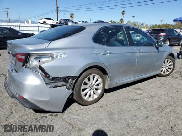 2019 Toyota Camry LE с VIN 4T1B11HKXKU821888, выставлен на аукционе Copart как лот 86159375 с пробегом 64 469 миль миль и Списание • Salvage title. История ставок и продаж доступна на DreamBid. Изображение 3.