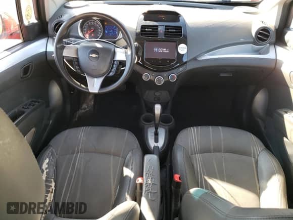 2014 Chevrolet Spark LT with VIN KL8CD6S99EC486774, listed as a Copart auction lot 87101235 with 136,601 mi miles and Clean title. Bid and sale history available at DreamBid. Image 8.