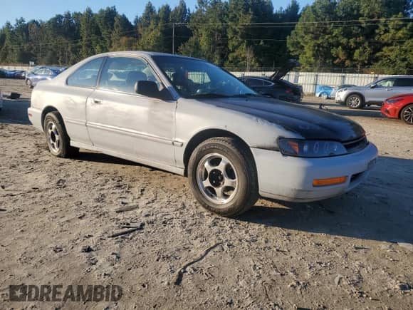 1997 Honda Accord EX with VIN 1HGCD726XVA022411, listed as a Copart auction lot 86822095 with 193,324 mi miles and Salvage title. Bid and sale history available at DreamBid. Image 4.