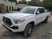 2022 Toyota Tacoma SR with VIN 3TYAX5GN0NT037122, listed as a Copart auction lot 85355205 with 73,416 mi miles and Salvage title. Bid and sale history available at DreamBid. Image 1.