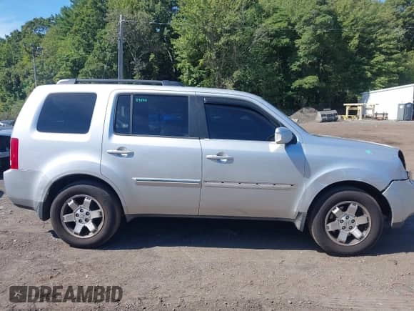2009 Honda Pilot Touring с VIN 5FNYF48929B043779, выставлен на аукционе IAAI как лот 43044349 с пробегом 197 551 миль миль и . История ставок и продаж доступна на DreamBid. Изображение 13.