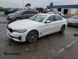 2023 BMW 5 Series 540i xDrive with VIN WBA73BJ0XPWY22700, listed as a Copart auction lot 69348915 with 39,019 mi miles and Salvage title. Bid and sale history available at DreamBid. Image 1.