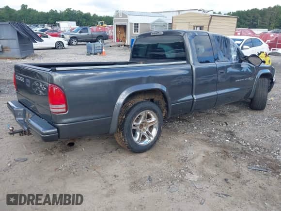 2002 Dodge Dakota with VIN 1B7GL32Z02S676880, listed as a IAAI auction lot 42982180 with 109,819 mi miles and . Bid and sale history available at DreamBid. Image 4.