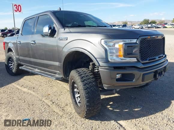 2020 Ford F-150 XL with VIN 1FTEW1E50LKE92875, listed as a IAAI auction lot 43108248 with 92,474 mi miles and . Bid and sale history available at DreamBid. Image 1.