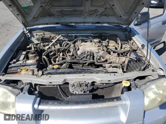 2003 Nissan Frontier XE with VIN 1N6ED29X43C434007, listed as a Copart auction lot 82172745 with 276,825 mi miles and Clean title. Bid and sale history available at DreamBid. Image 11.